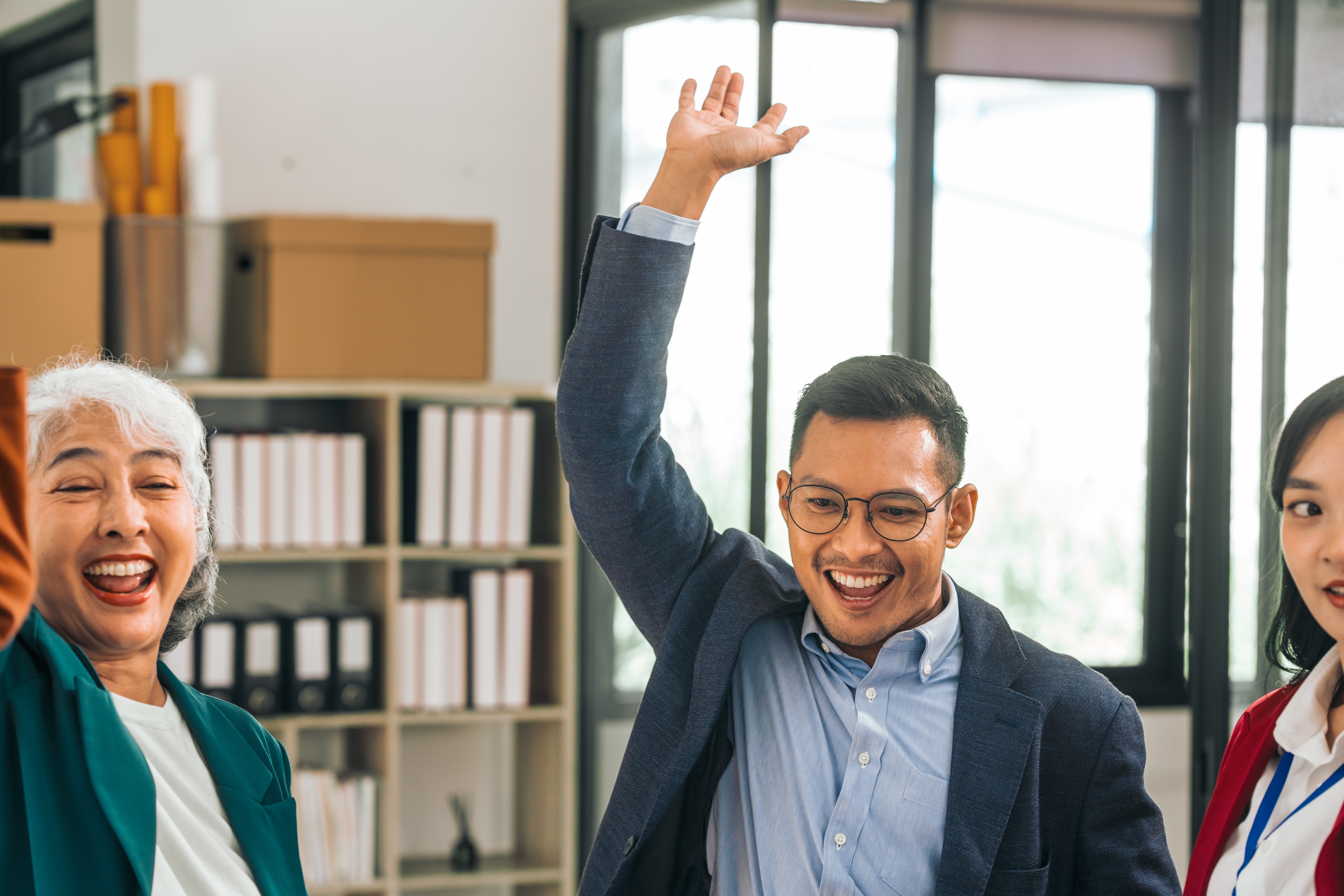 family members celebrating for the success of their business structured with the help of family business corporate services in Singapore (1).jpeg